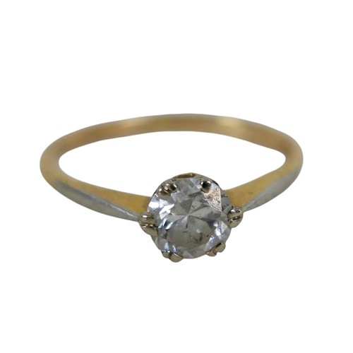 17 - A yellow gold and diamond solitaire ring, the round faceted stone approximately 0.60ct, surface test... 