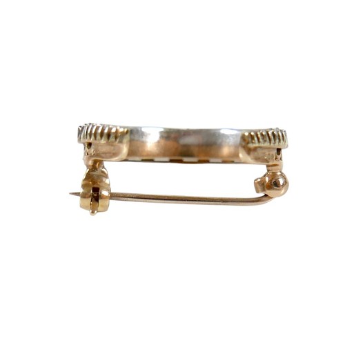 51 - A Victorian 9ct gold and diamond crescent shaped brooch, set with fifteen graduated diamonds, the la... 