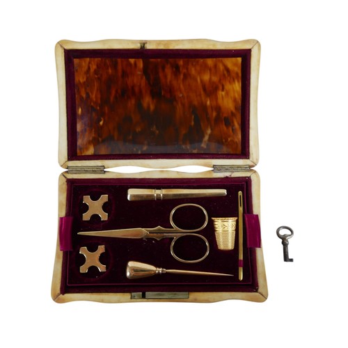 231 - A Dutch 19th century tortoiseshell etui with 14k gold sewing implements, the red velvet lined interi... 