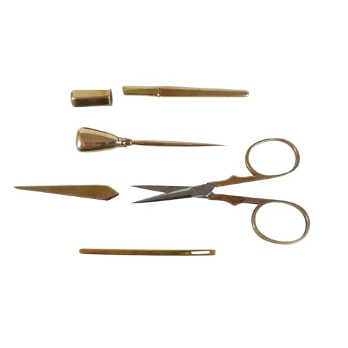 231 - A Dutch 19th century tortoiseshell etui with 14k gold sewing implements, the red velvet lined interi... 