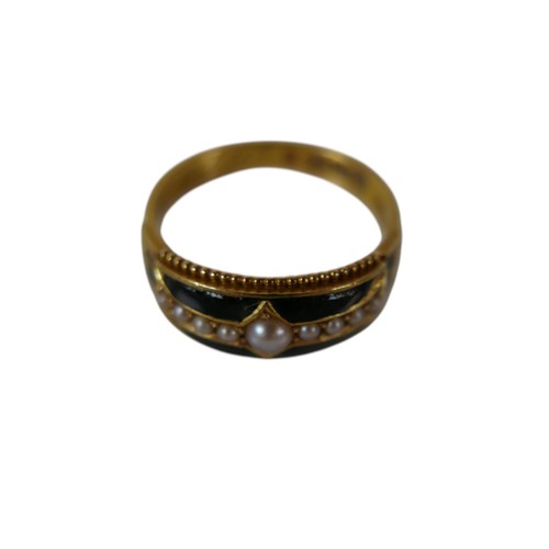 44 - A Victorian 18ct yellow gold mourning ring, set with nine seed pearls in a black enamel surround, en... 