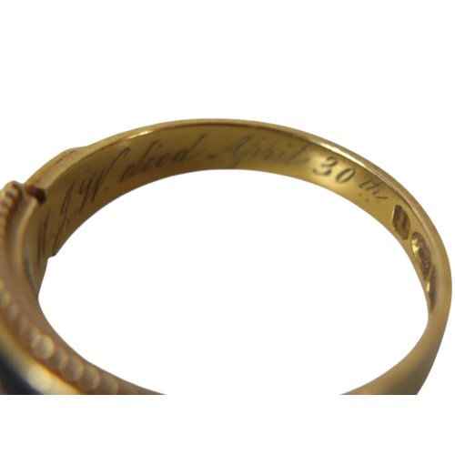 44 - A Victorian 18ct yellow gold mourning ring, set with nine seed pearls in a black enamel surround, en... 