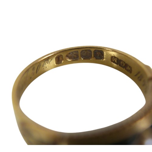 44 - A Victorian 18ct yellow gold mourning ring, set with nine seed pearls in a black enamel surround, en... 