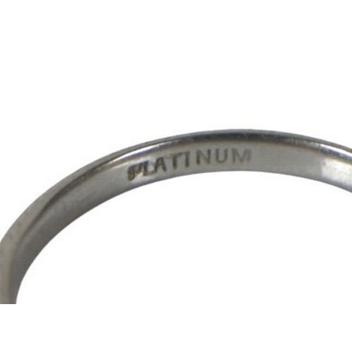 38 - A platinum wedding band ring, with engraved leaf frieze decoration, 2.3mm wide, size N, 2.9g.