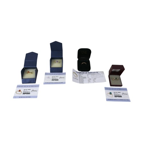 49 - A group of four 9k gold rings, comprising one set with three small alexandrite stones and two diamon... 