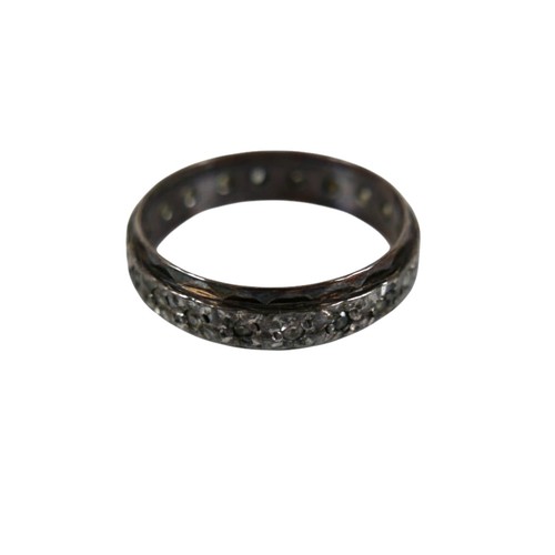 46 - A group of four white metal rings, comprising one set with a row of six marquise cut emeralds, each ... 