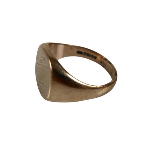 47 - A 9ct yellow gold signet ring, engraved with blank chevron and foliate scrolls, 14.3mm wide, size U,... 