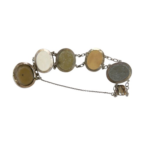 19 - An Edward VII silver nurse's belt buckle, engraved with a swan surrounded by foliage, Reynolds & Wes... 