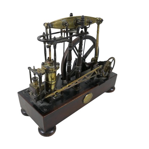 225 - A William IV model of a rotative beam engine, mounted on a mahogany stand with brass plaque inscribe... 