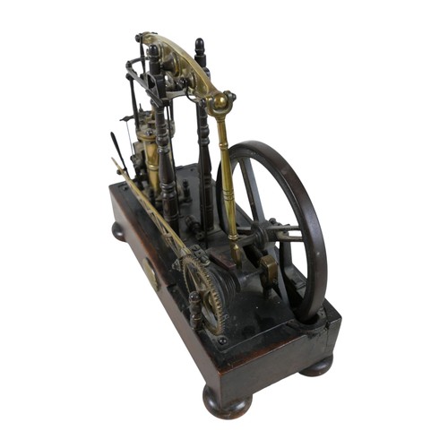 225 - A William IV model of a rotative beam engine, mounted on a mahogany stand with brass plaque inscribe... 