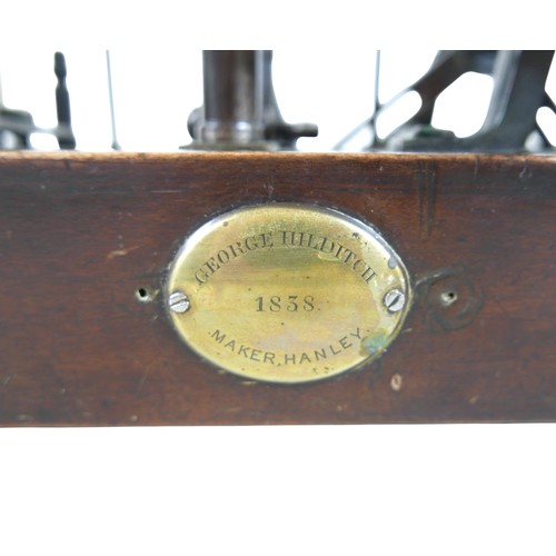 225 - A William IV model of a rotative beam engine, mounted on a mahogany stand with brass plaque inscribe... 