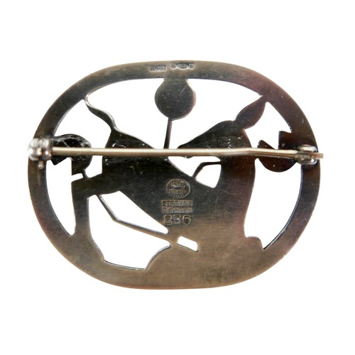 32 - A Georg Jensen silver oval brooch with a deer surrounded by flowers, hallmarked verso and stamped wi... 