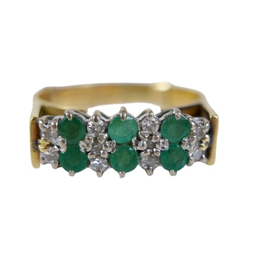 63 - An 18ct gold emerald and diamond ring, the six round cut emerald stones, each approximately 2mm diam... 