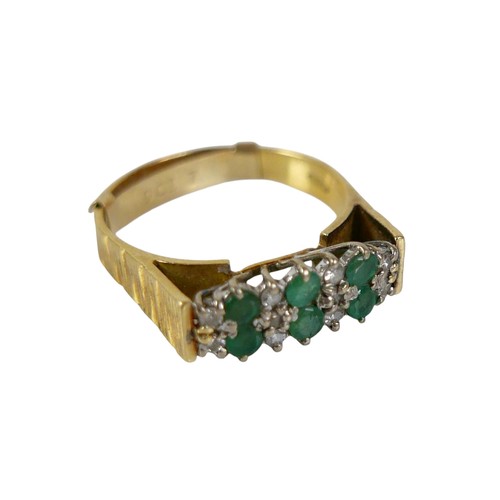 63 - An 18ct gold emerald and diamond ring, the six round cut emerald stones, each approximately 2mm diam... 