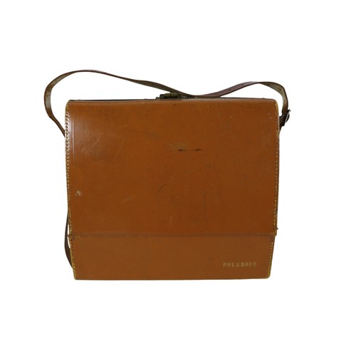 169 - A collection of nine vintage cameras comprising a Polaroid land camera, Voigtlander Vito B and Promi... 