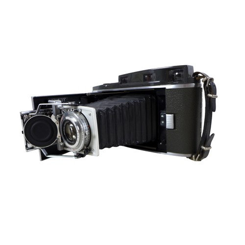 169 - A collection of nine vintage cameras comprising a Polaroid land camera, Voigtlander Vito B and Promi... 