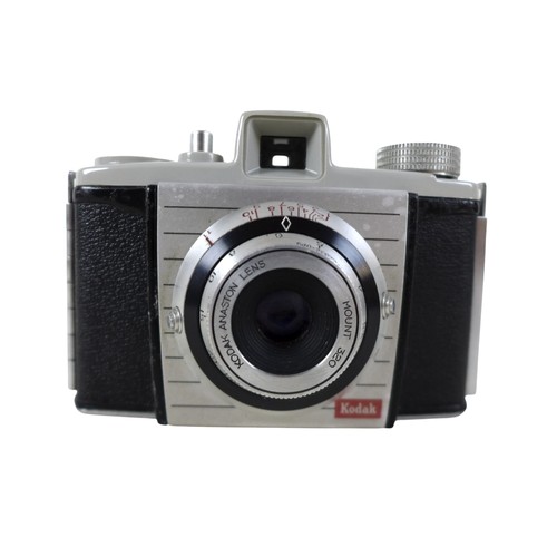 169 - A collection of nine vintage cameras comprising a Polaroid land camera, Voigtlander Vito B and Promi... 