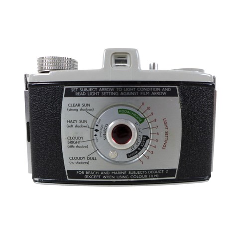169 - A collection of nine vintage cameras comprising a Polaroid land camera, Voigtlander Vito B and Promi... 