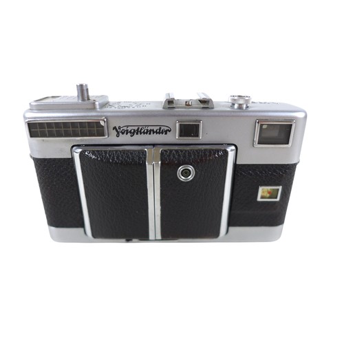 169 - A collection of nine vintage cameras comprising a Polaroid land camera, Voigtlander Vito B and Promi... 