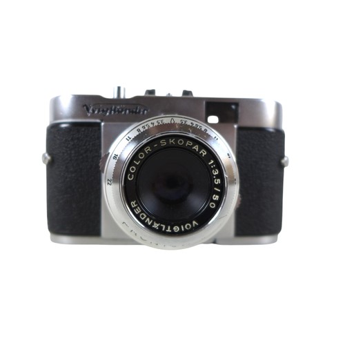 169 - A collection of nine vintage cameras comprising a Polaroid land camera, Voigtlander Vito B and Promi... 