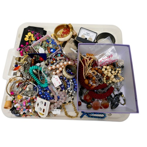 26 - A large collection of assorted costume jewellery and watches. (3 trays)