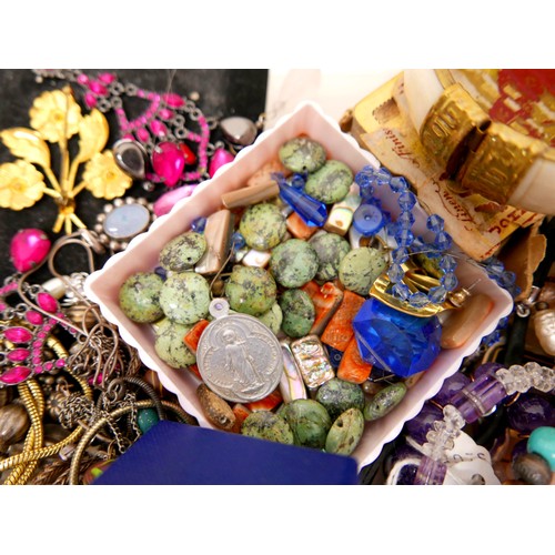 26 - A large collection of assorted costume jewellery and watches. (3 trays)