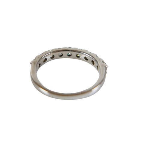 23 - A diamond and moissanite silver ring, set with five round cut diamonds and four moissanites, each 2.... 
