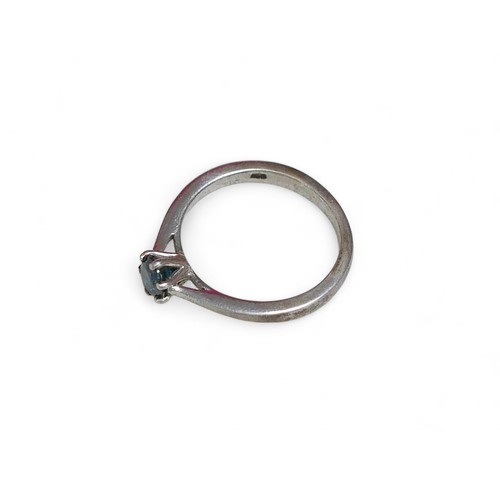 25 - A blue stone diamond solitaire silver ring, round cut stone approximately 4.5mm diameter, 2.4g.