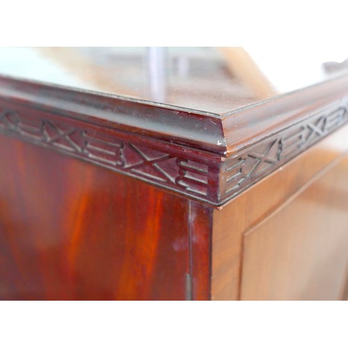 483 - An Irish George III style linen cabinet on stand possibly by Hicks, with a blind fretwork frieze abo... 