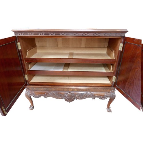 483 - An Irish George III style linen cabinet on stand possibly by Hicks, with a blind fretwork frieze abo... 