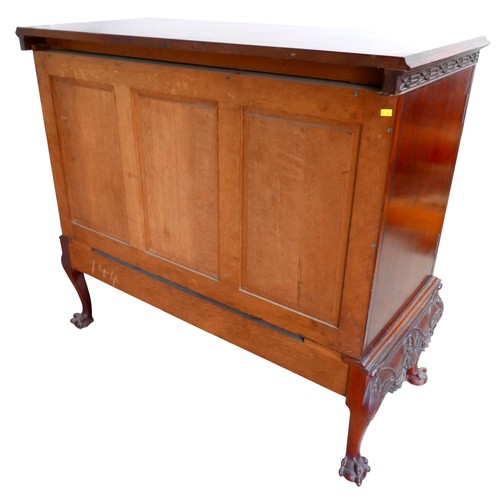 483 - An Irish George III style linen cabinet on stand possibly by Hicks, with a blind fretwork frieze abo... 