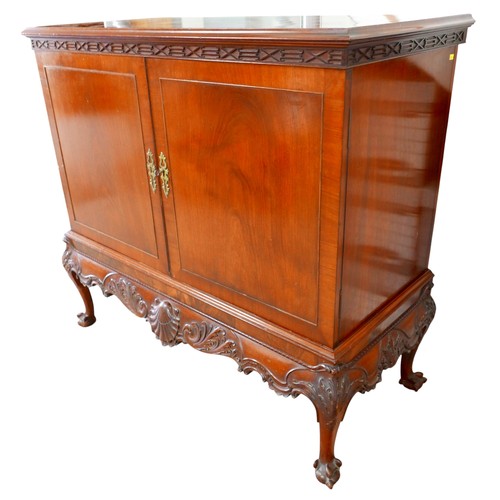 483 - An Irish George III style linen cabinet on stand possibly by Hicks, with a blind fretwork frieze abo... 