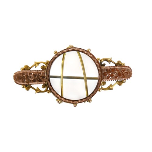 59 - A 9ct rose gold brooch (sovereign holder), 4.3cm surround, 2.8g, plus a circular hinged 9ct gold loc... 