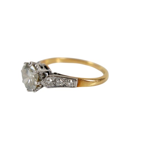 1 - An 18ct gold, platinum and diamond ring, the central brilliant cut diamond approx 1.6ct, each should... 