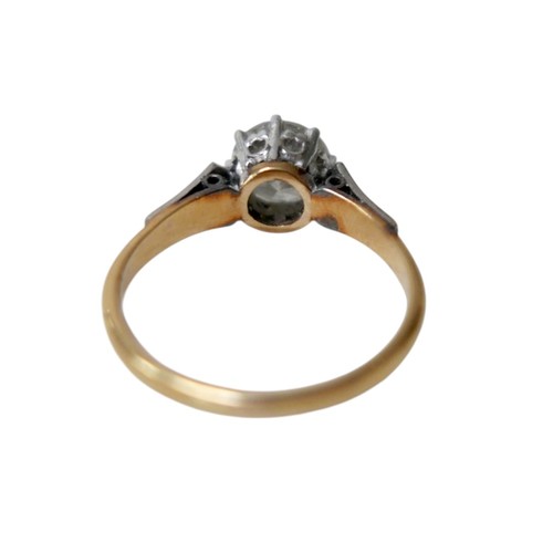 1 - An 18ct gold, platinum and diamond ring, the central brilliant cut diamond approx 1.6ct, each should... 