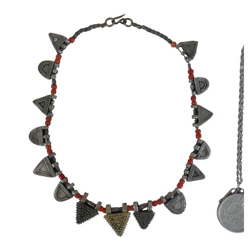 130 - A small collection of Georgian and later coins and a tribal necklace, approximately 2.0toz of silver... 