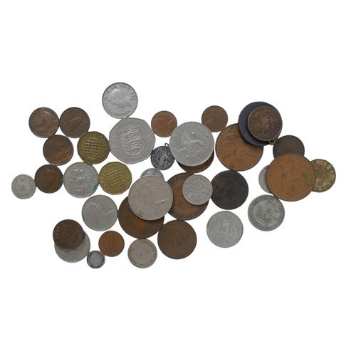 130 - A small collection of Georgian and later coins and a tribal necklace, approximately 2.0toz of silver... 