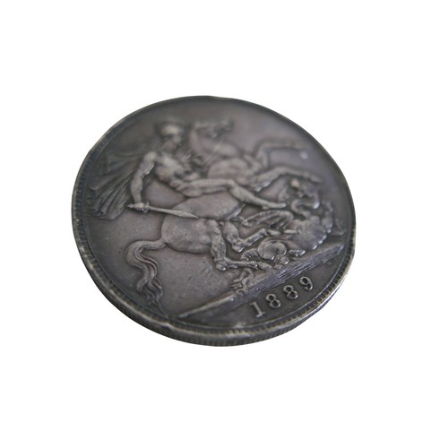 130 - A small collection of Georgian and later coins and a tribal necklace, approximately 2.0toz of silver... 