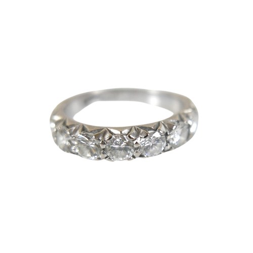 5 - An 18ct white gold and seven stone diamond ring, set with a row of round brillliant cut stones, 3.7 ... 