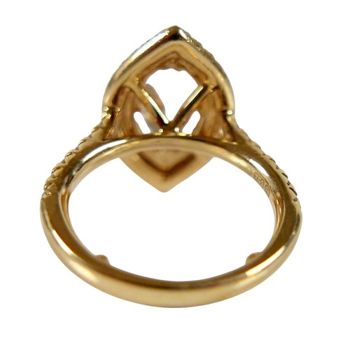 1 - An 18ct yellow gold and diamond ring, set with a 1.0ct marquise cut diamond, 9.8 by 5.4 by 3.3mm, co... 