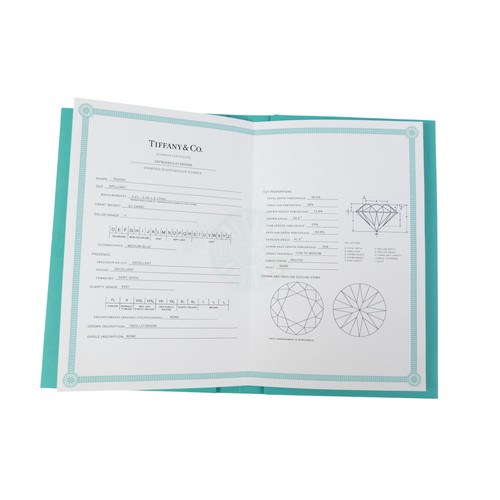 2 - A Tiffany & Co platinum and diamond solitaire ring, set with a round brilliant cut 0.52ct stone, 5.2... 