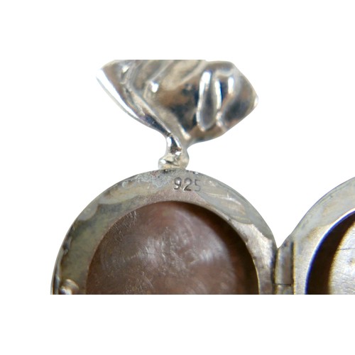 59 - A group of jewellery, comprising a yellow metal / gilt metal small seal fob, 22mm, set with a pink s... 