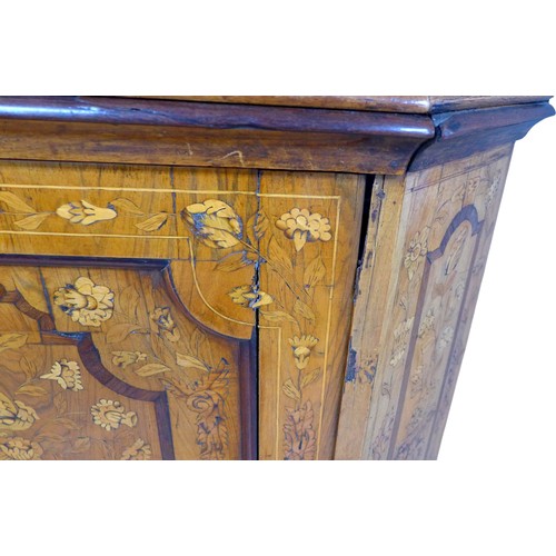 451 - A Dutch early 18th century marquetry sideboard, with twin cupboard doors opening to reveal internal ... 