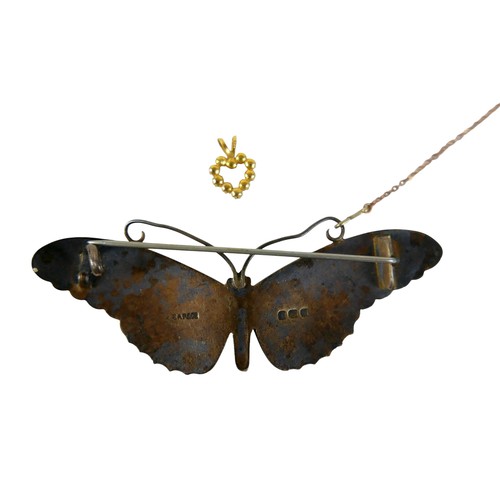 10 - A 9ct gold heart shaped pendant with sapphire and white stones, 1 by 1.3cm, 0.4g, together with a si... 