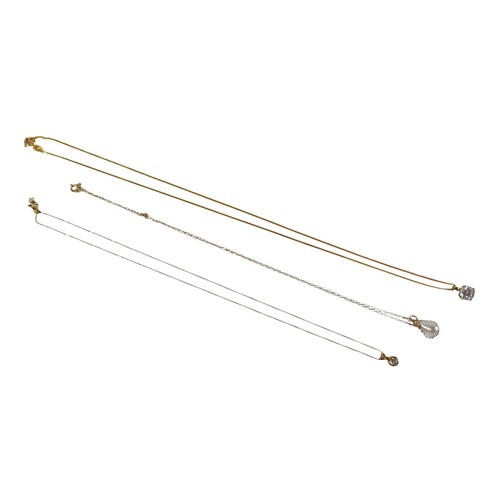 36 - Three 9ct gold chain necklaces, two with white stone pendants, another with a pearl pendant, 3.6g gr... 