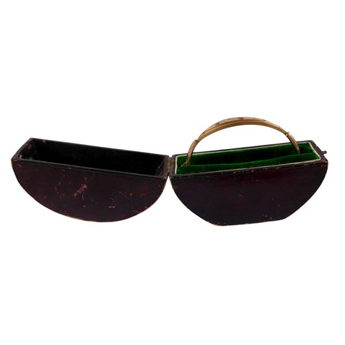 50 - A 9ct yellow gold diamond and ruby hollow bangle 6 x 6.5cm, weight 4.7g, with box.