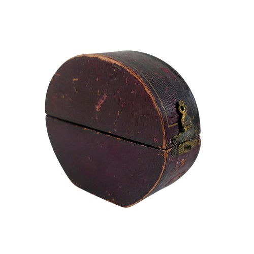 50 - A 9ct yellow gold diamond and ruby hollow bangle 6 x 6.5cm, weight 4.7g, with box.