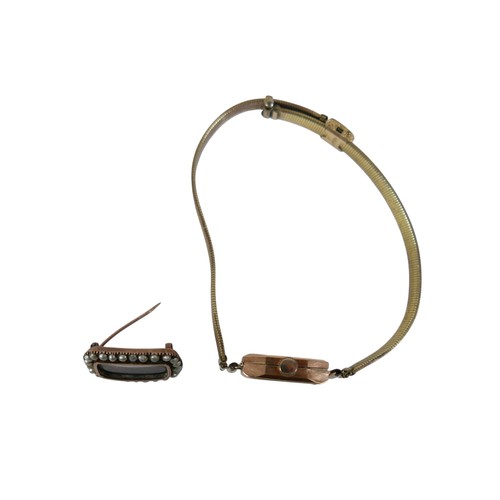 51 - A 19th century gilt metal mourning brooch together with a 9ct yellow gold watch head on plated strap... 