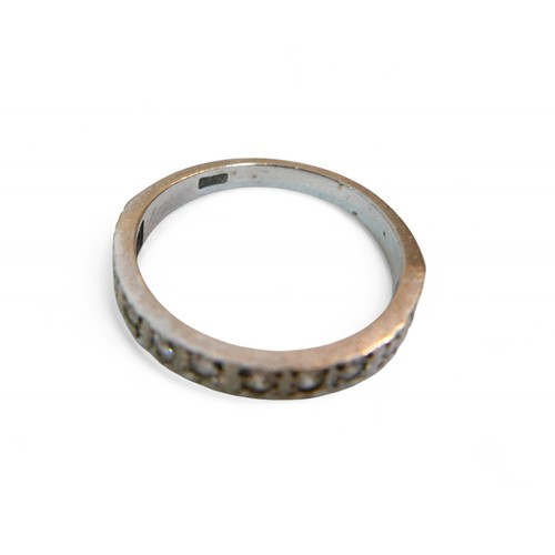 34 - An 18ct white gold and diamond half eternity ring, each stone approximately 1mm diameter, size L/M, ... 