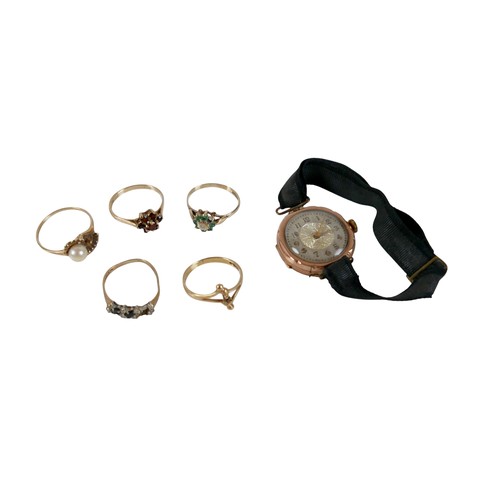 60 - Five 9ct gold dress rings, comprising a garnet daisy ring, size N, 1.5g, a pearl ring a/f, size O, 1... 